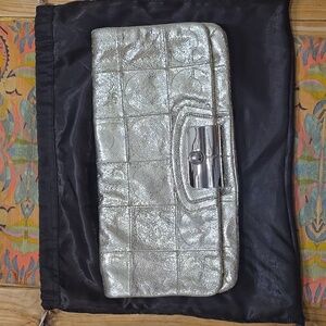 Coach gold oversized clutch